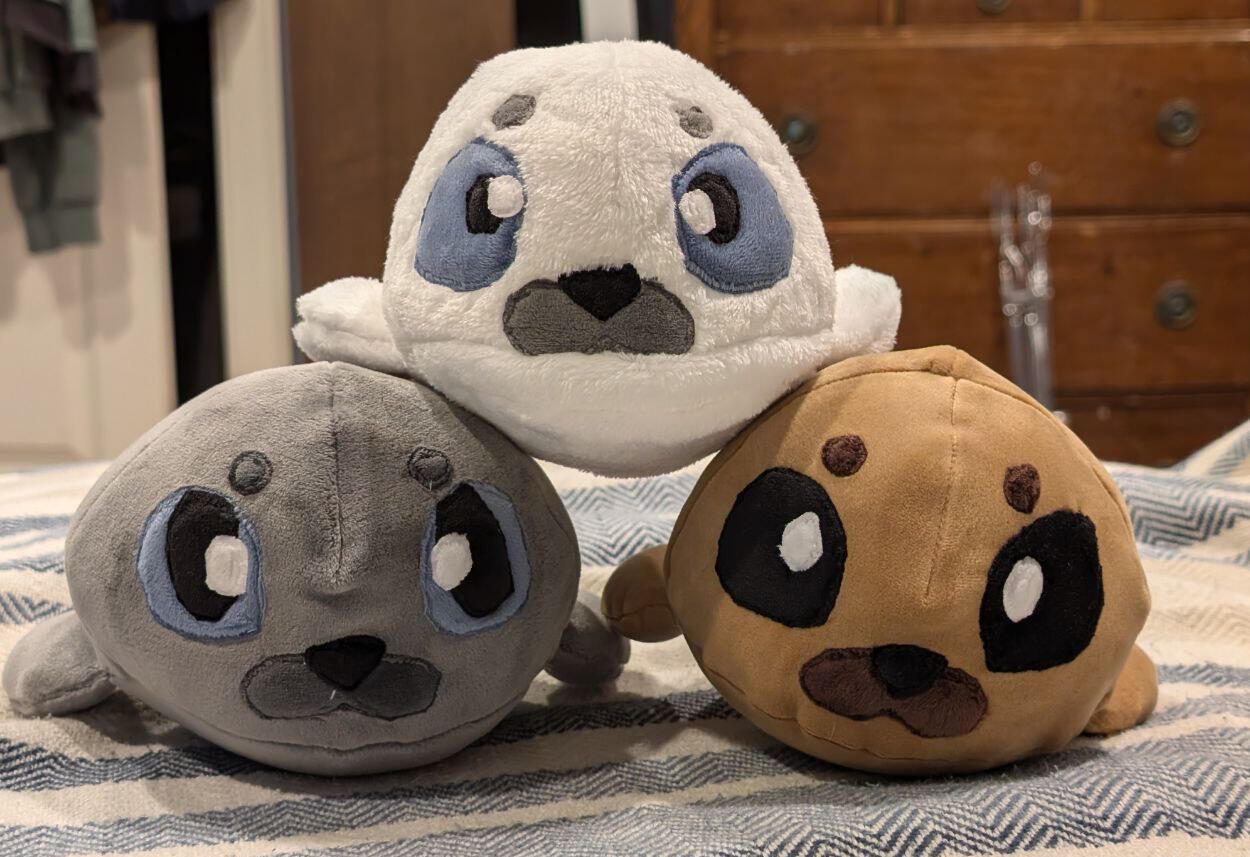 Family of seal plushies